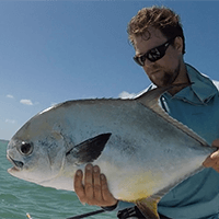 captain josh holding a fish