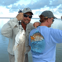 captain steve holding a fish