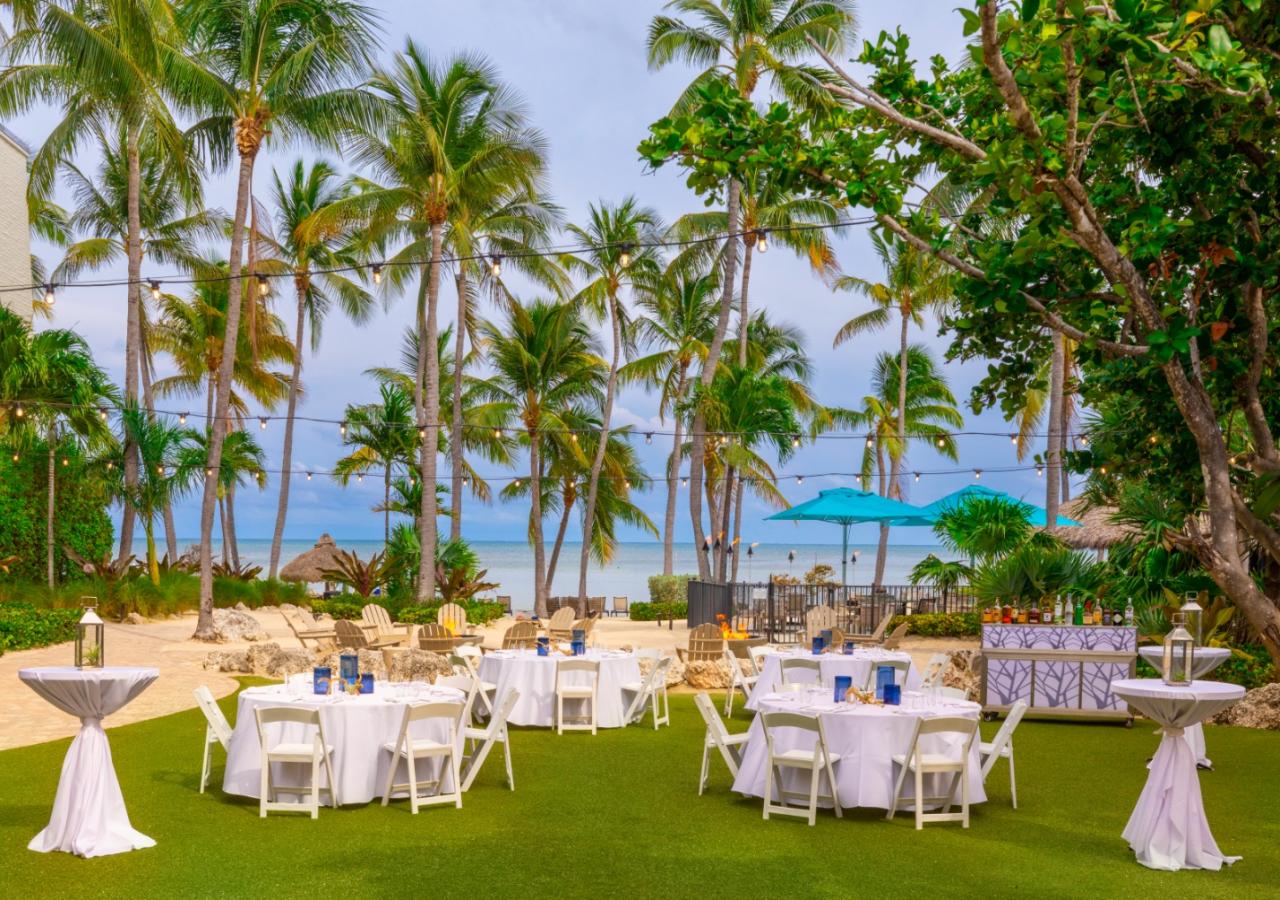 Reef lawn at Amara Cay with a wedding reception set-up.