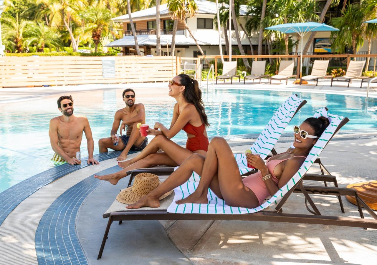 A group of friends hanging out at the pool at La Siesta Resort in the Florida Keys.
