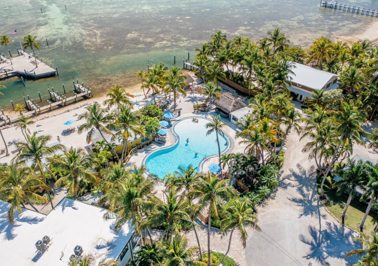An aerial view of La Siesta Resort, an oceanfront property in the Florida Keys with a pool and more.