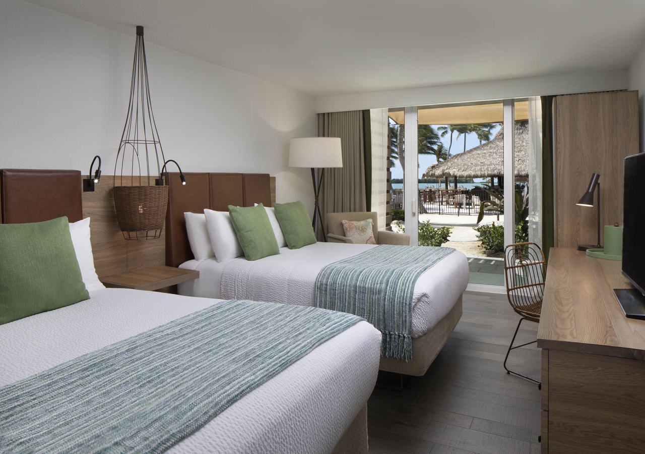 bedroom with two queen beds and view of matecumbe courtyard