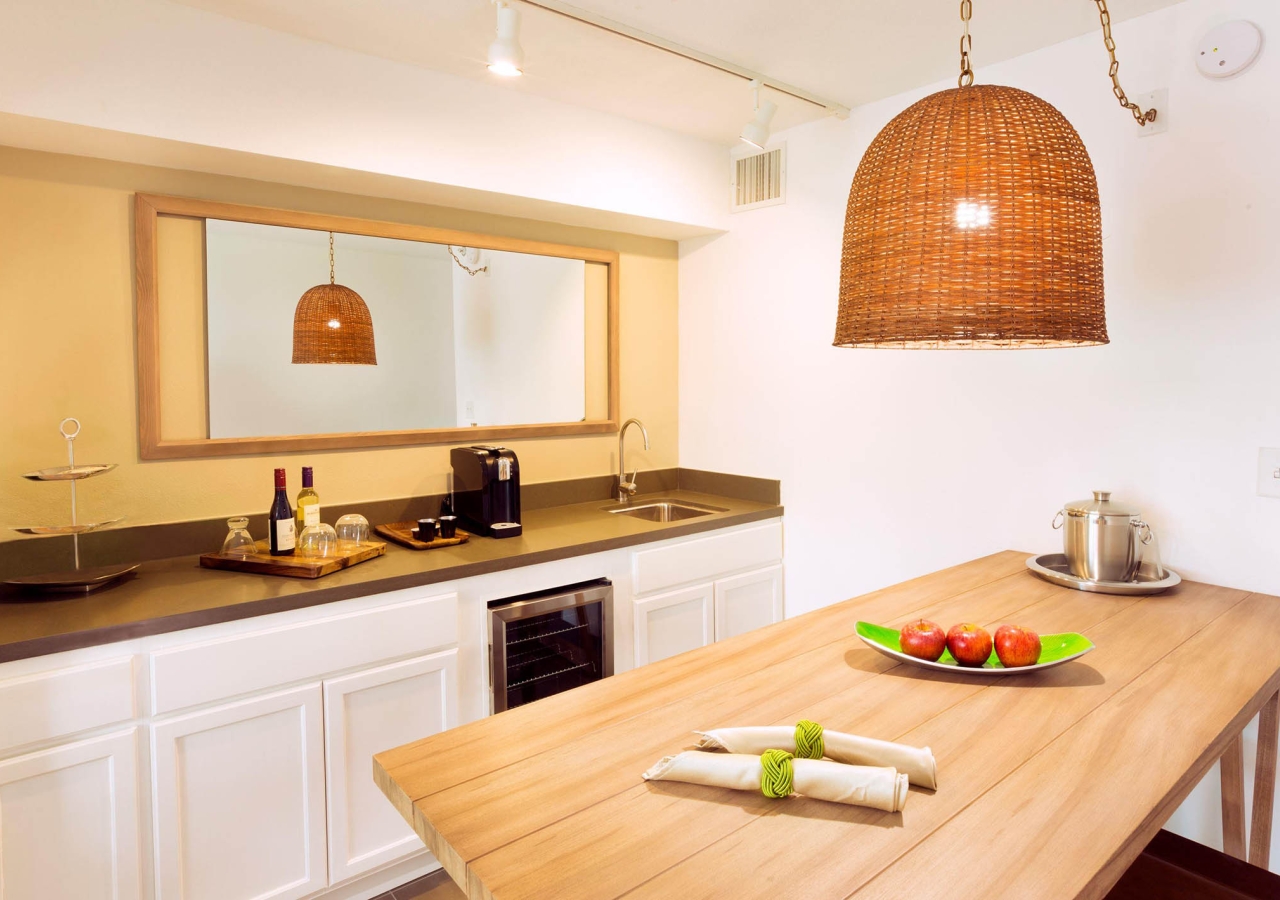 small kitchen area with dining room table