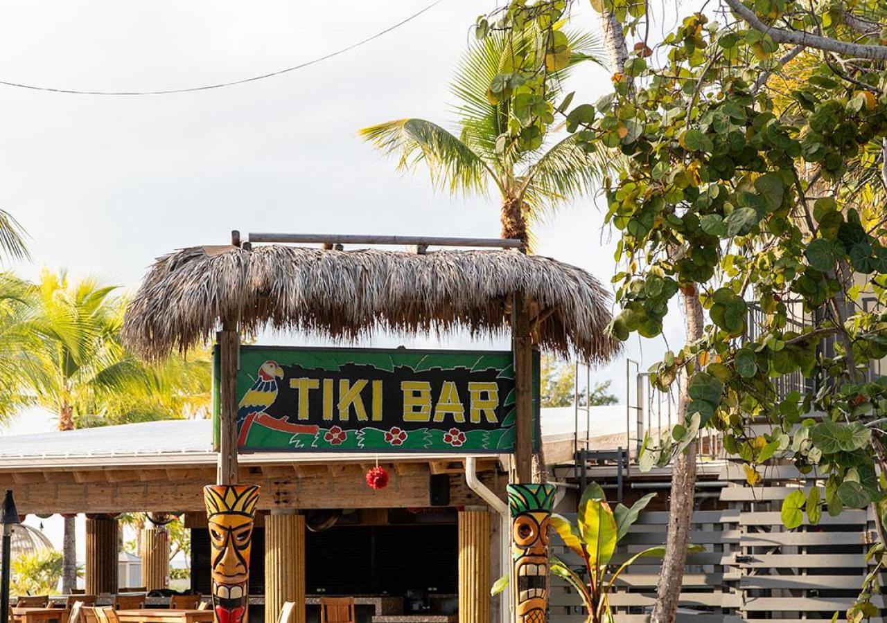 The original Tiki Bar sign at Three Waters Resort & Marina in Islamorada, Florida.
