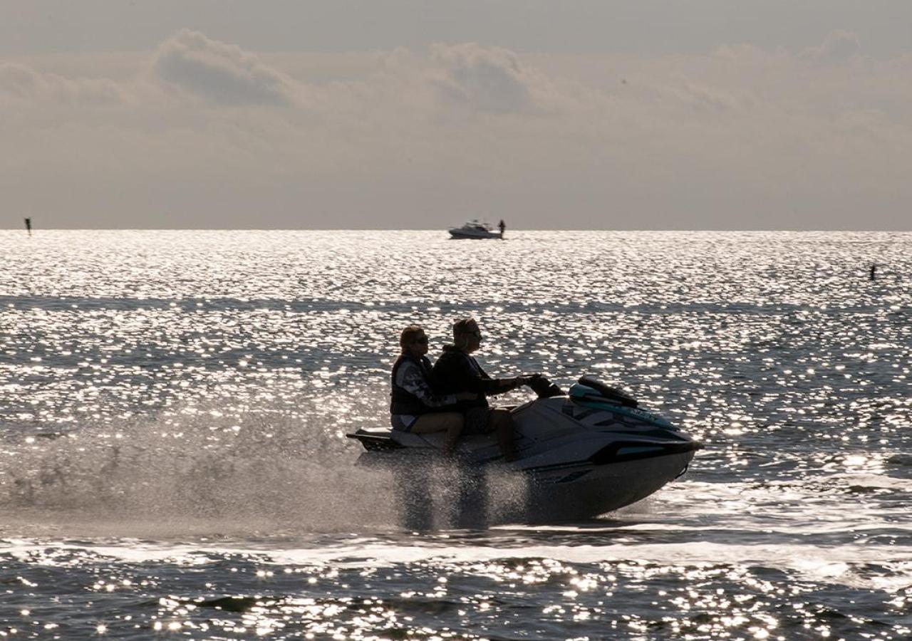 Two people jet skiing at Three Waters Resort & Marina in the Florida Keys.