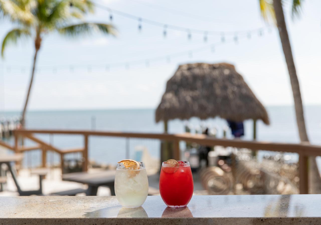 Two drinks on the bar at Sidecar by the pool in the Florida Keys at La Siesta Resort.