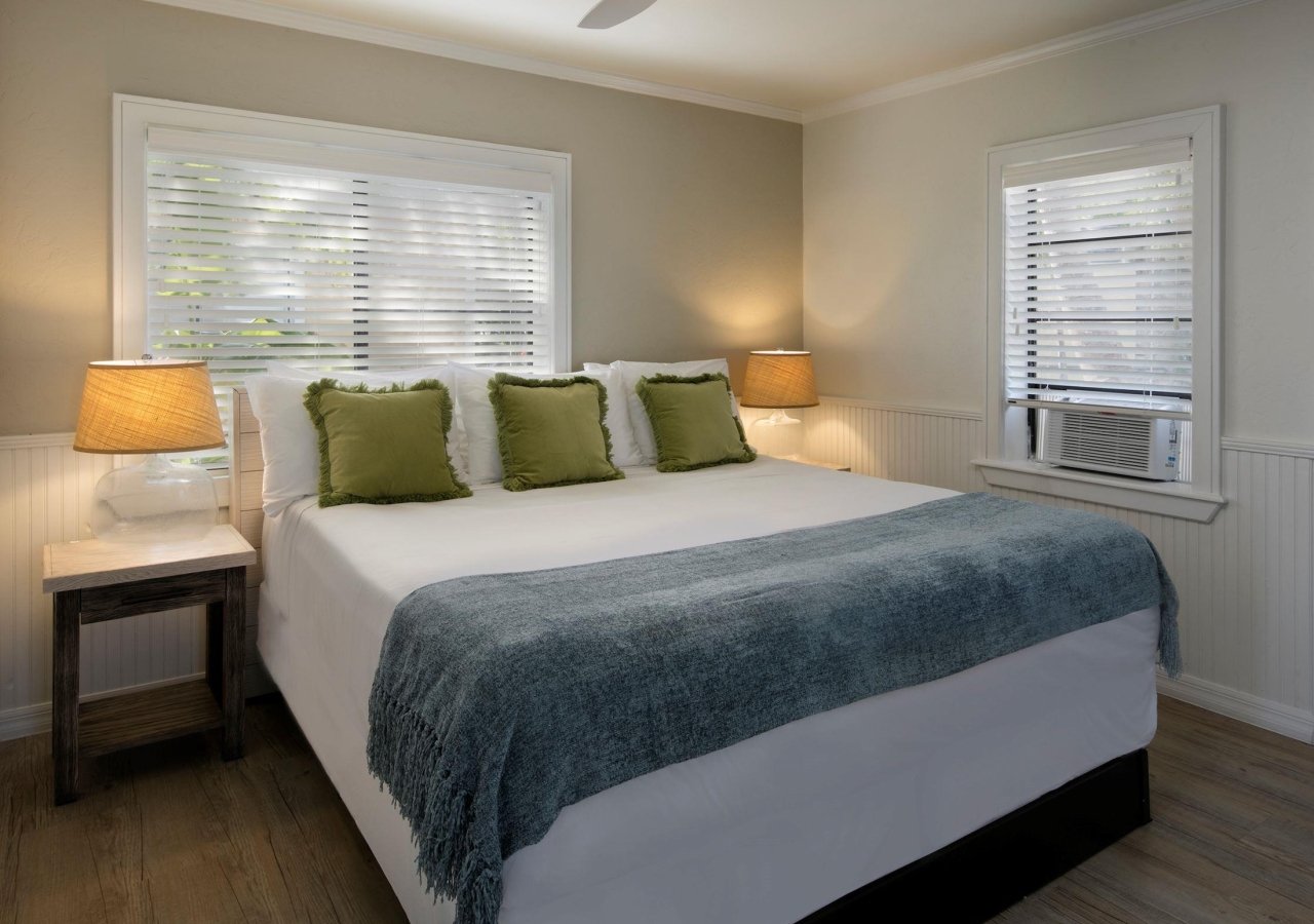 bedroom with air conditioner in the window