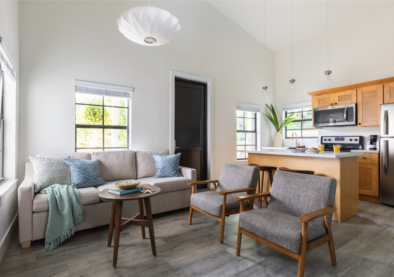 living room with sofa and two chairs