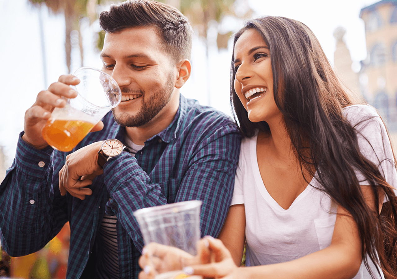 a couple enjoying a beer