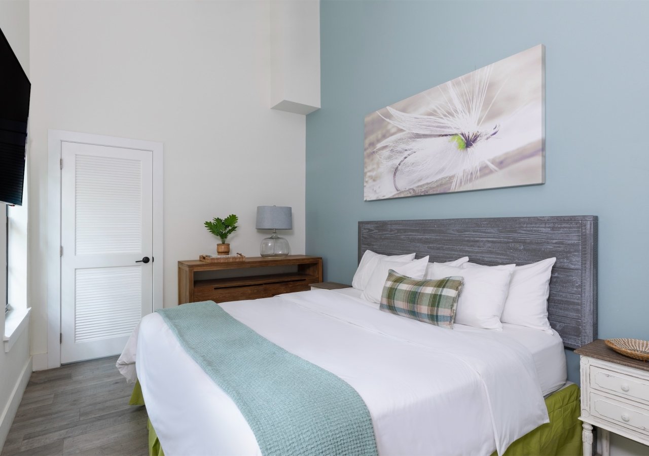 bedroom with sea blue wall and lime green highlights