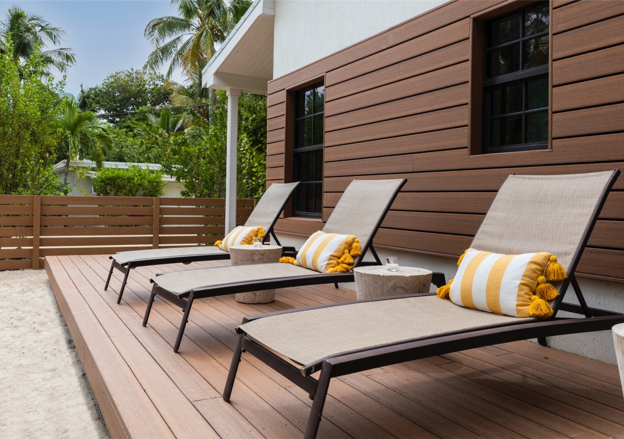 close up of lounge chairs on back patio