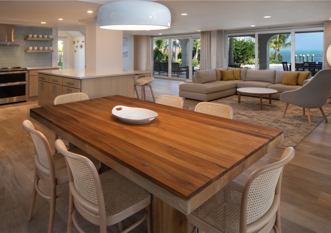 kitchen table with view of sectional in the back