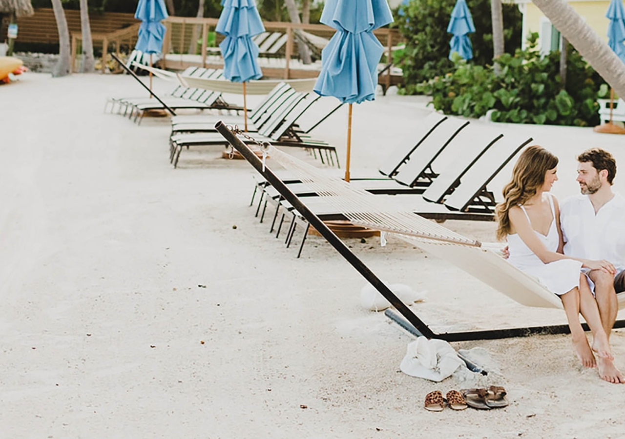 Couple sitting on beachchairs