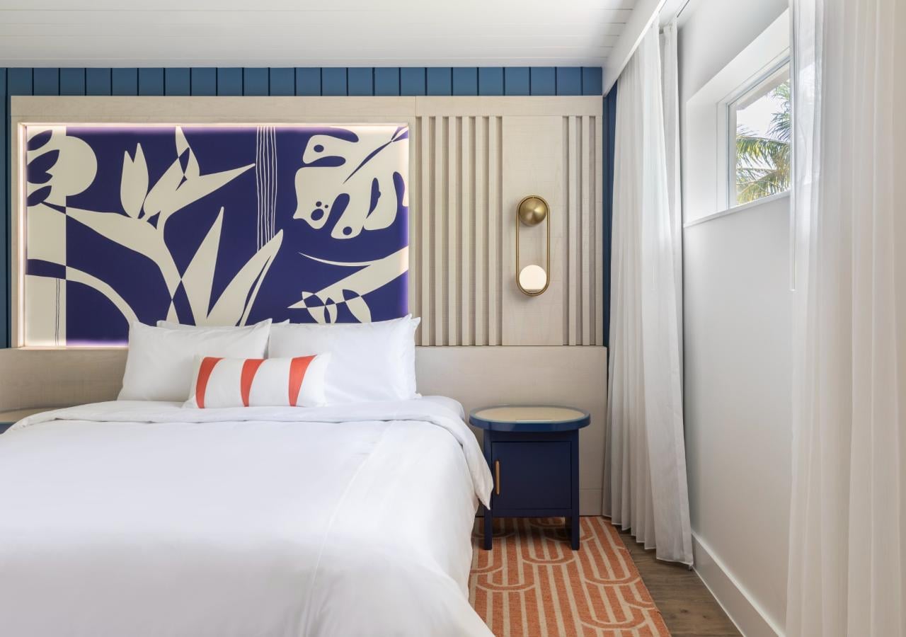A King bed in The Village 2 BDR Sandbar Suite, 2 Kings at Three Waters Resort & Marina in Islamorada, Florida