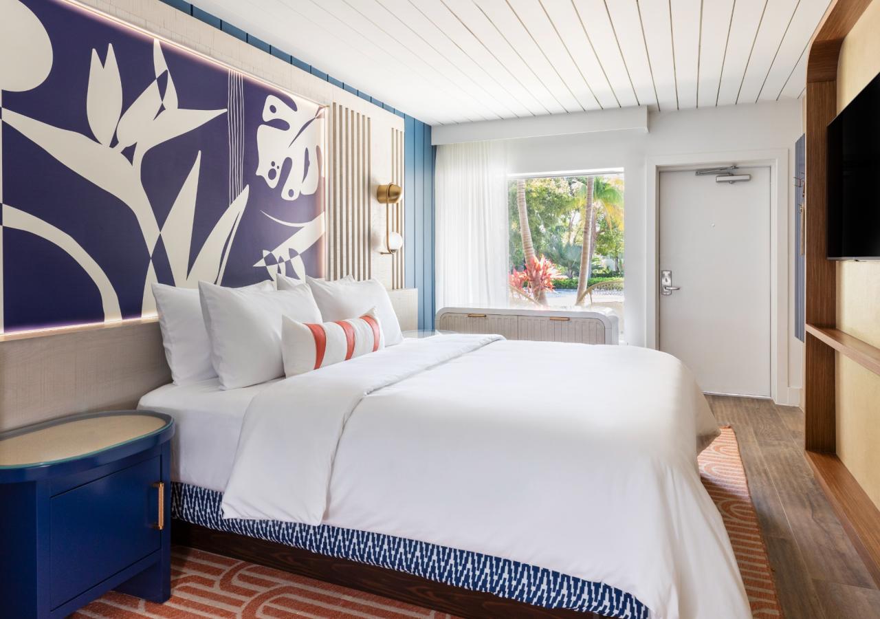 A King bed in The Village 2 BDR Sandbar Suite, 2 Kings at Three Waters Resort & Marina in Islamorada, Florida