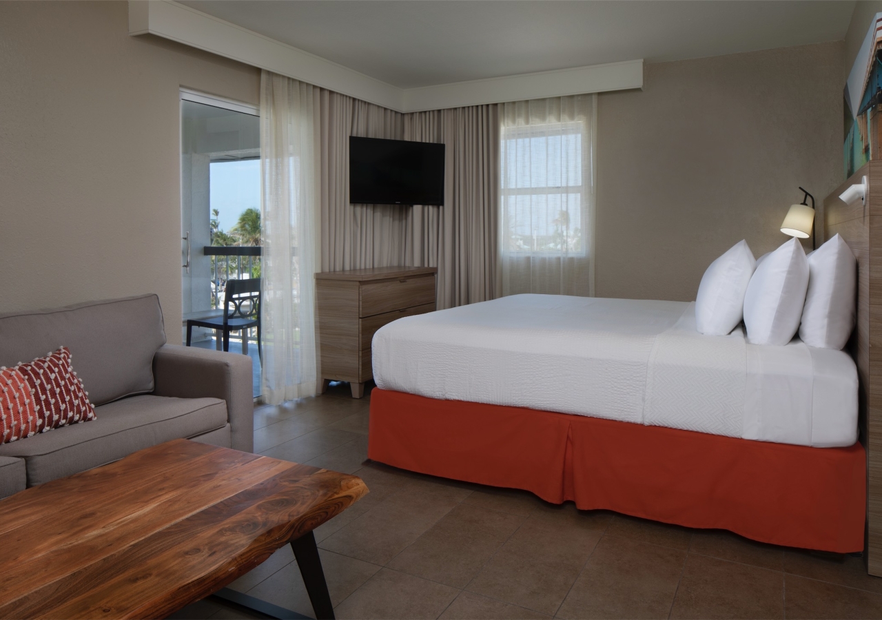 bedroom with sofa and table