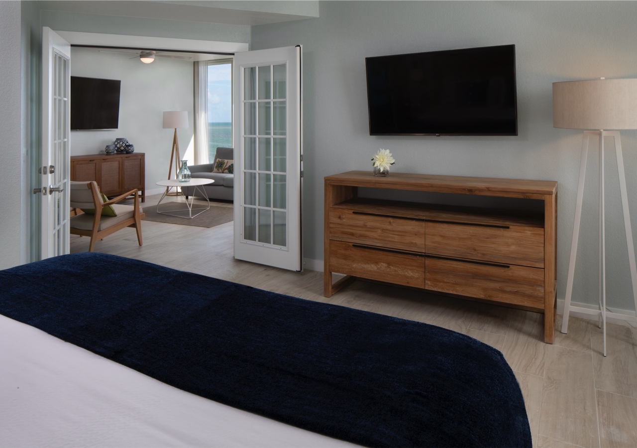 bedroom with view of living room