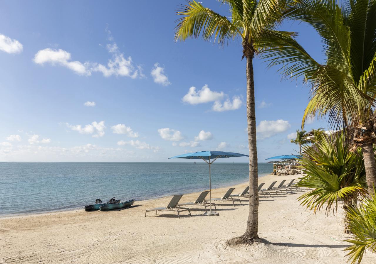 Mermaid Beach with umbrella and beach chairs