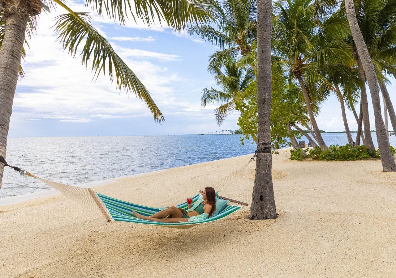 woman in hammock at beach