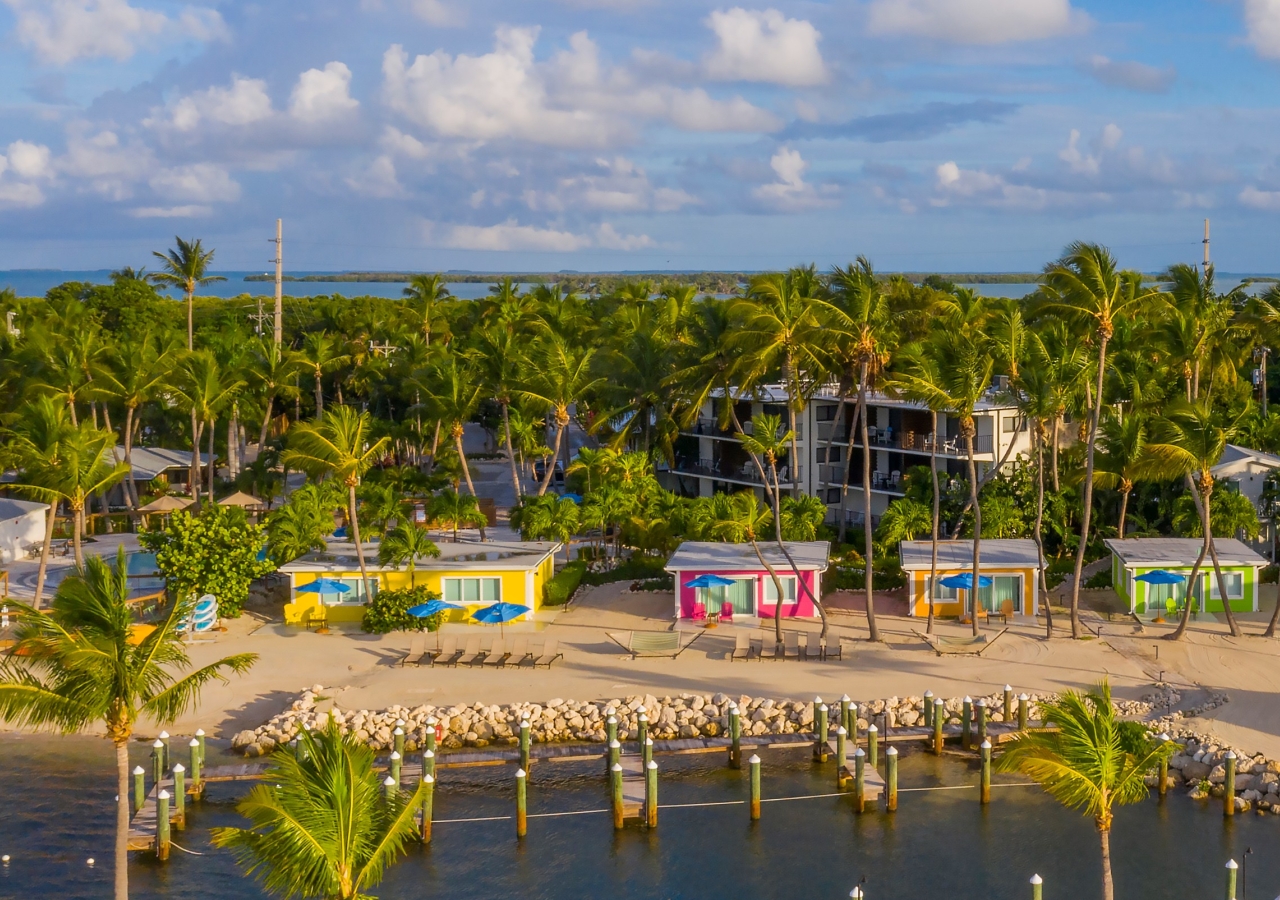 Row of colorful cottages with Casa de Juan in the background