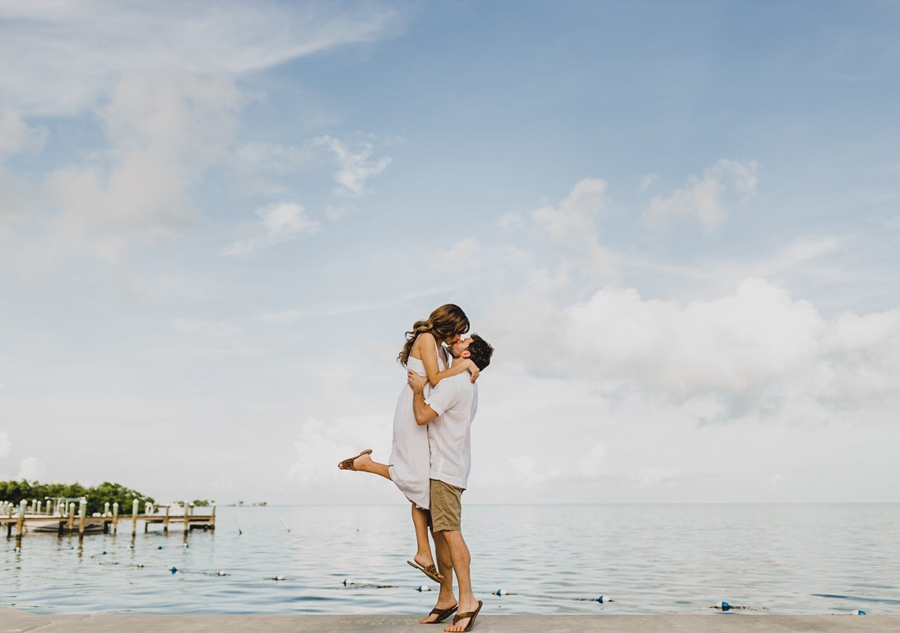 couple kissing on the beach