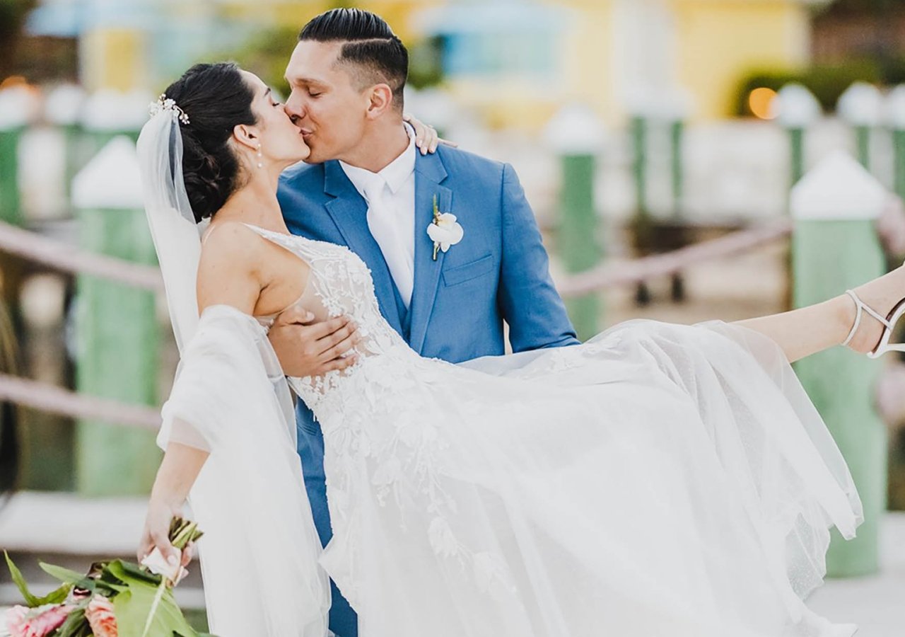 groom kissing his bride