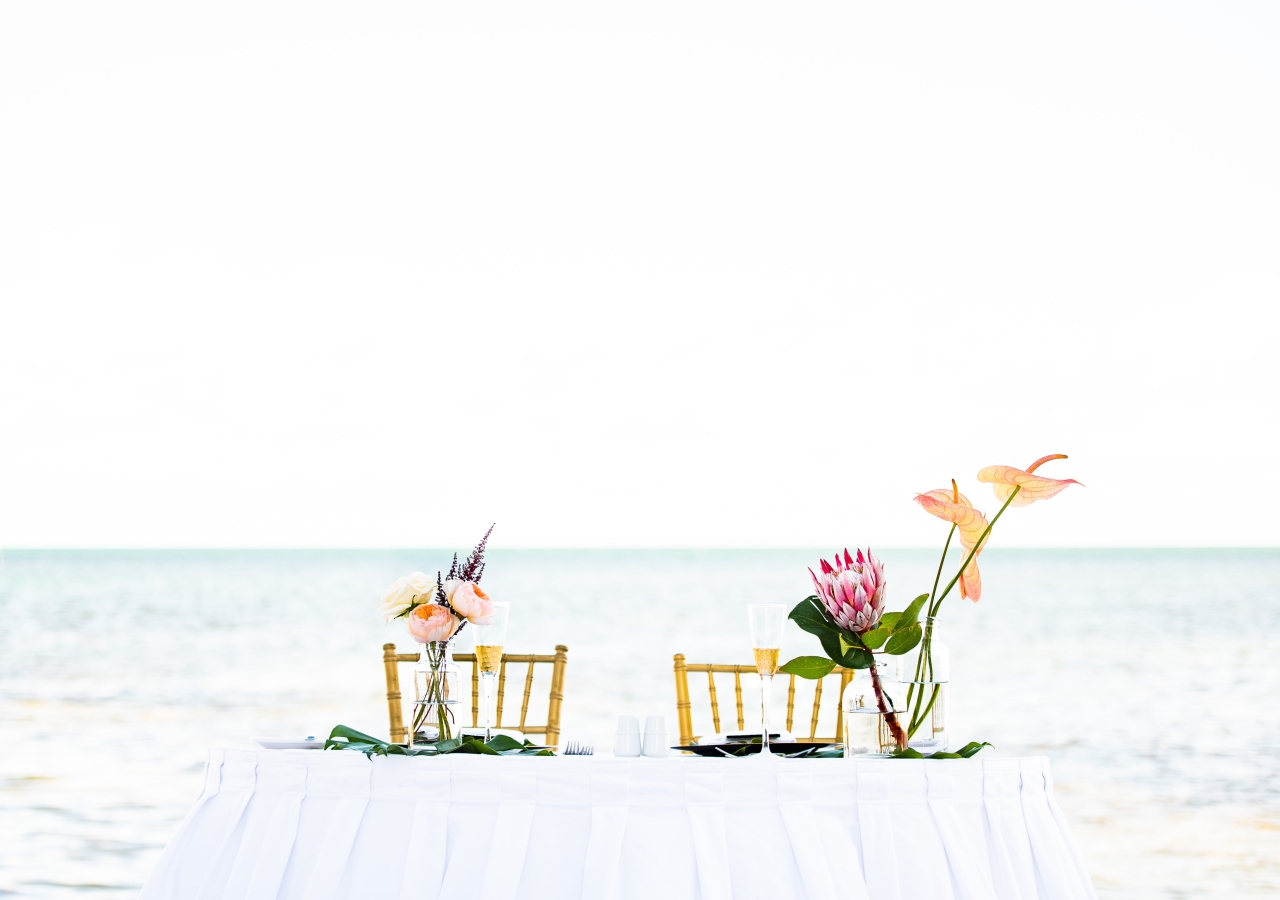 elegant wedding signing tale with tropical flowers