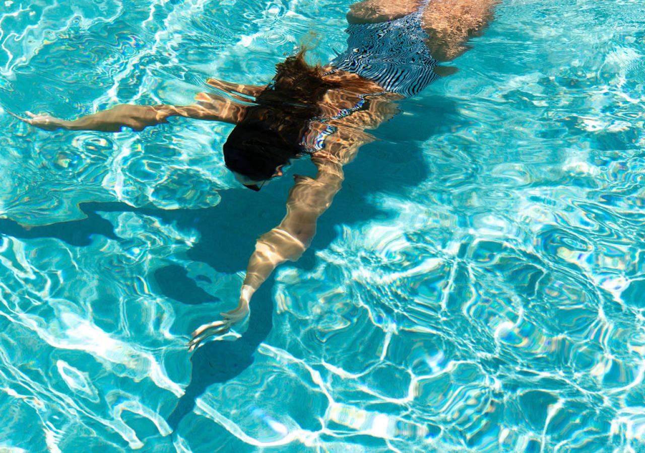 Woman swimming underwater