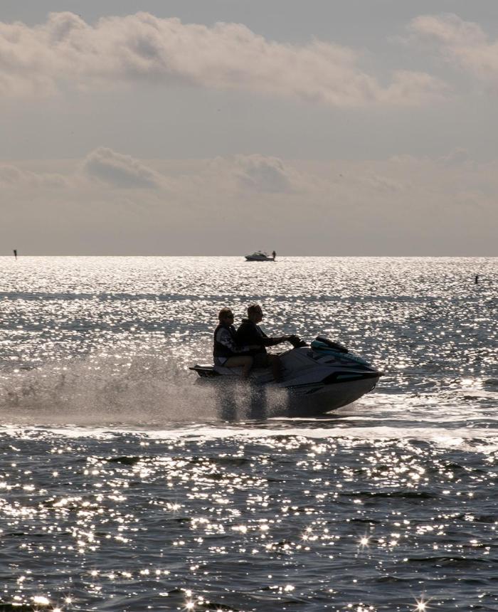 Two people jet skiing at Three Waters Resort & Marina in the Florida Keys.