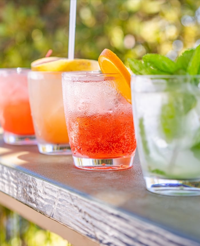 cocktails on wooden ledge