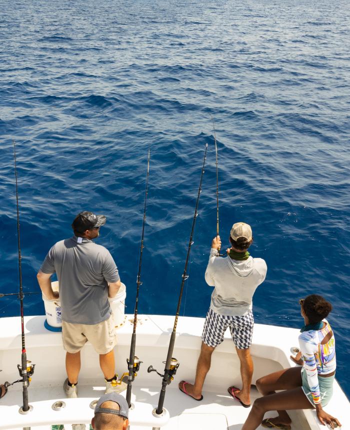 People fishing from a boat