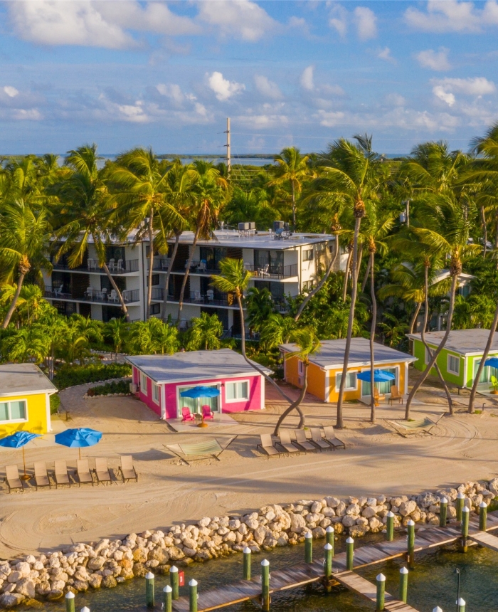 aerial shot of ocean front cottages and beach