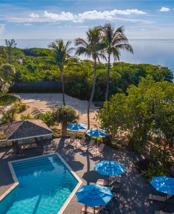 aerial shot of pelican cove pool with view of ocean