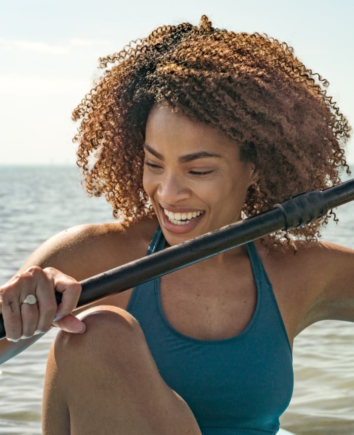 Woman paddleboarding