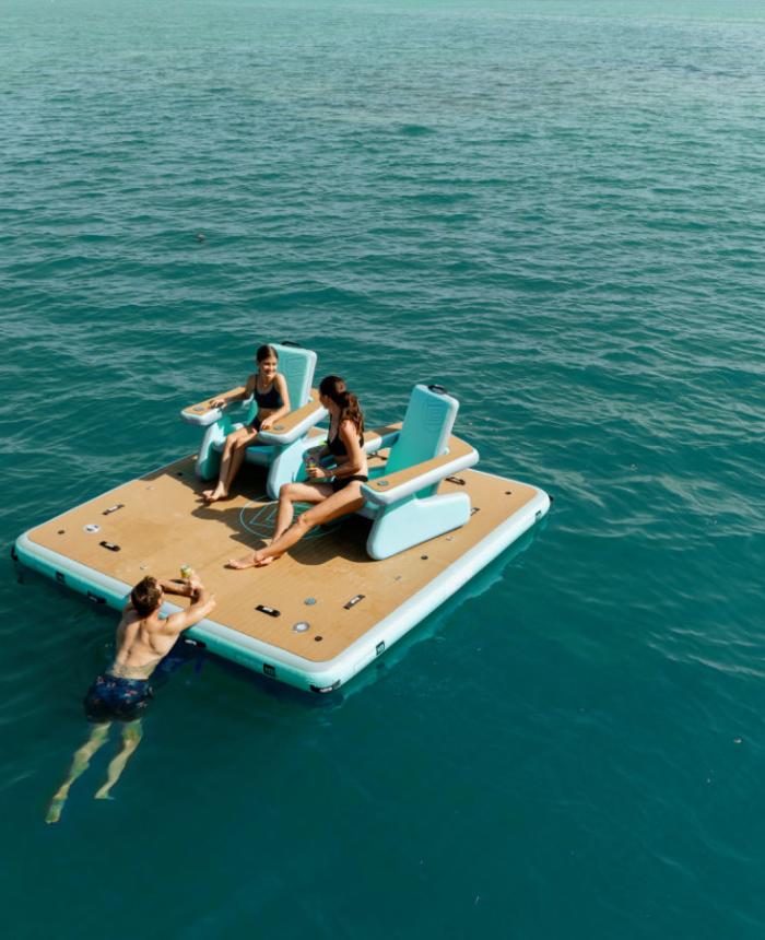 Three Waters Resort - Man swims up to BOTE dock 