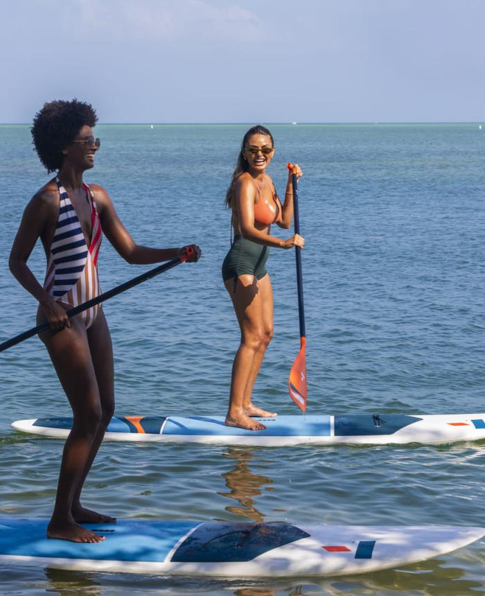 two women on paddleboards