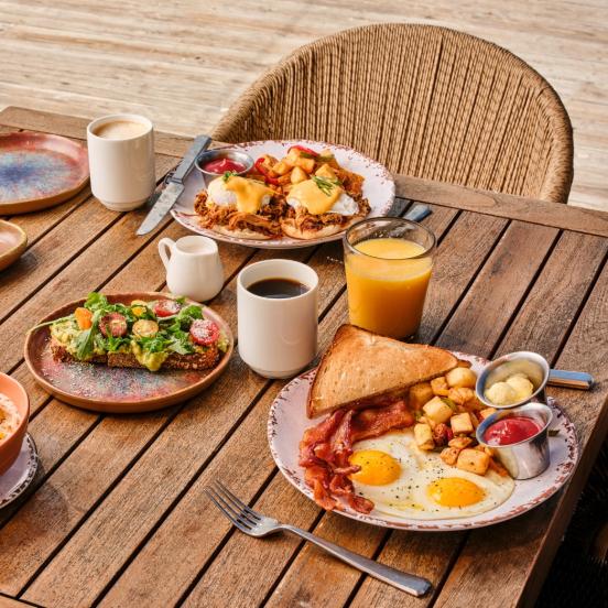 A table full of breakfast food from Mercado Morada.