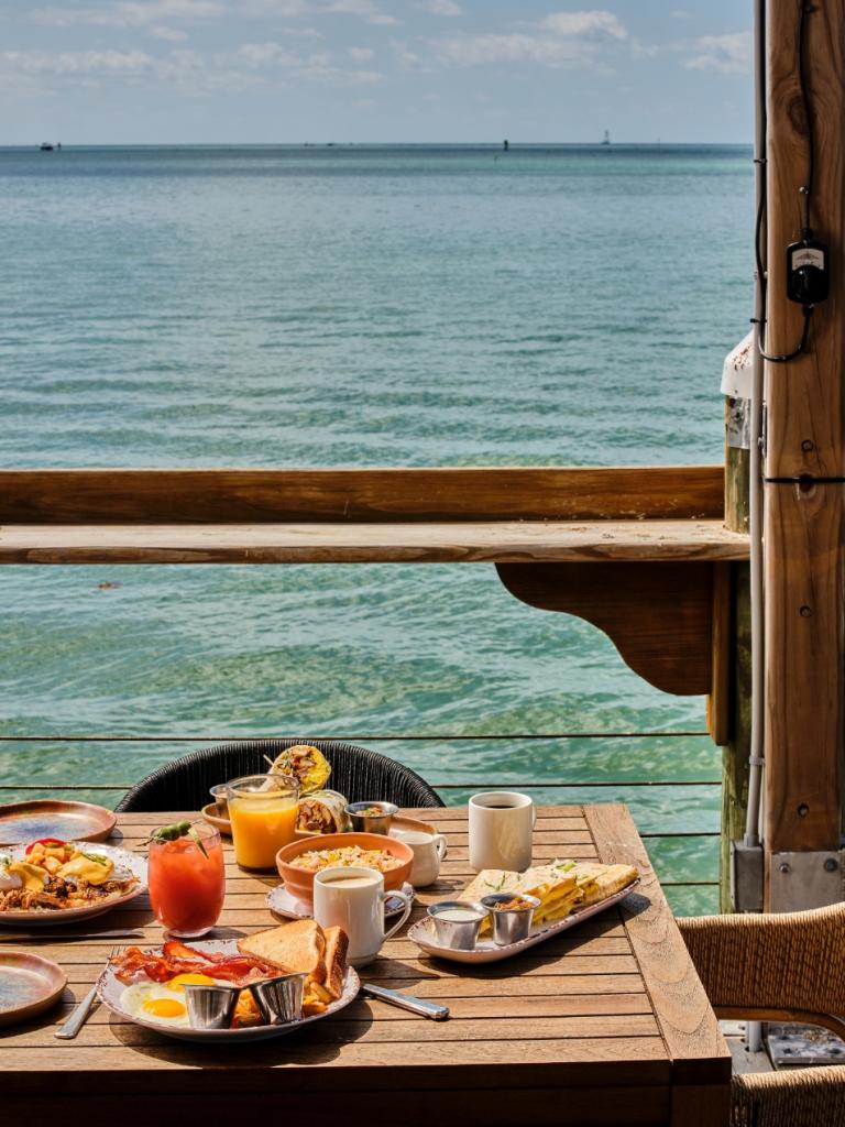 Breakfast at Mercado Morada with an ocean view.