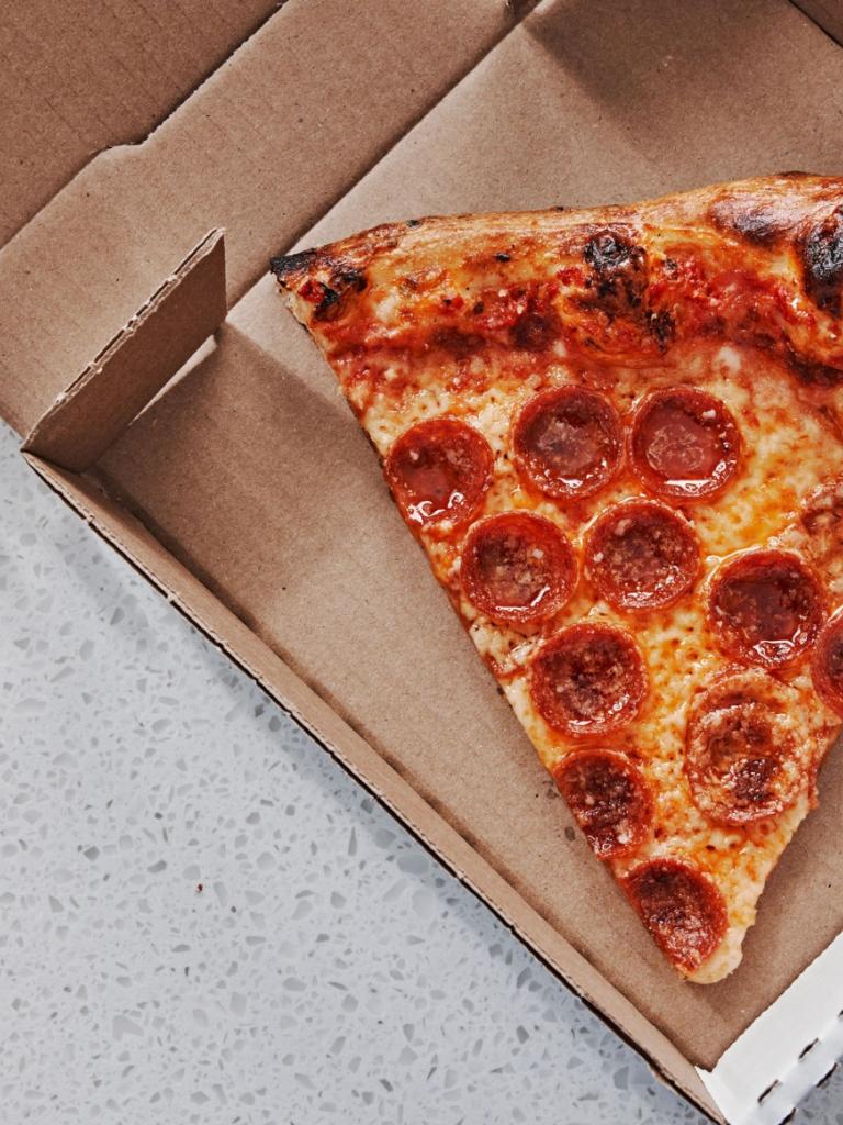 A slice of pepperoni pizza