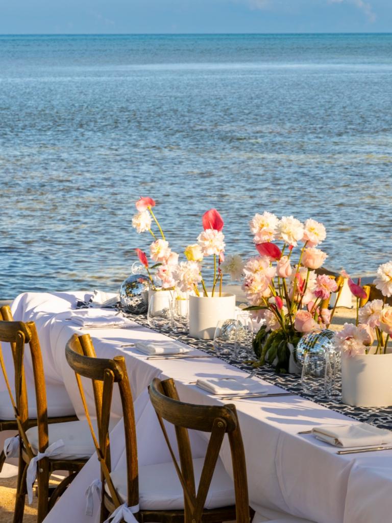 Wedding reception by the ocean at Amara Cay Resort.