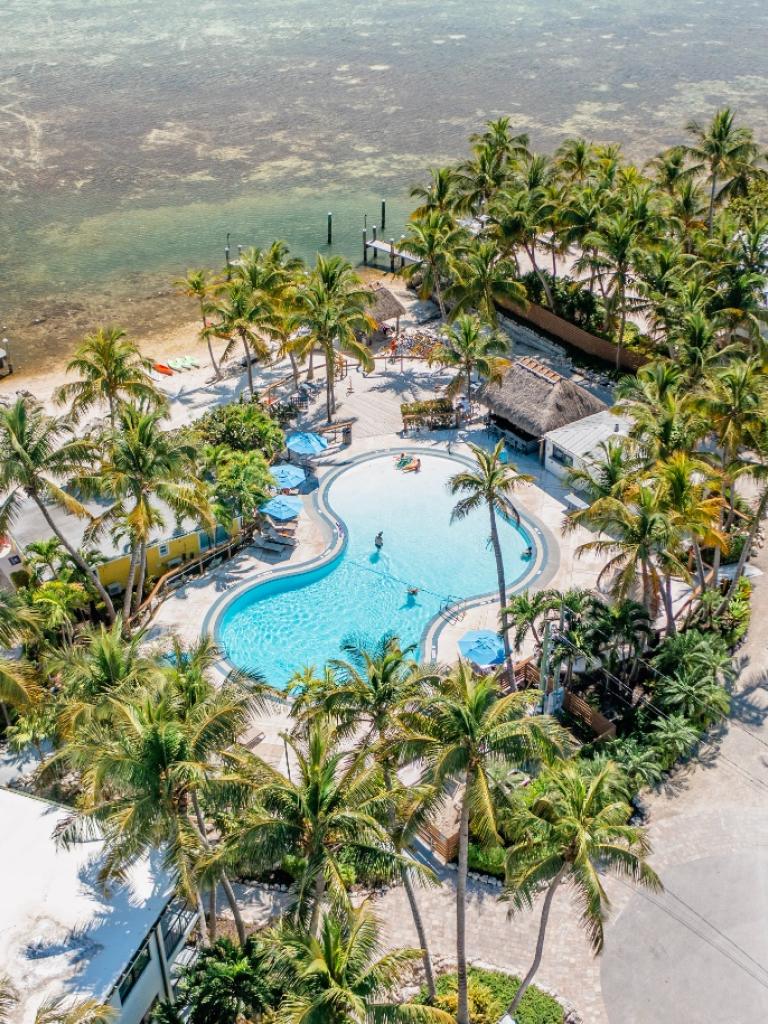 An aerial view of La Siesta's oceanfront pool and beach in the Florida Keys.
