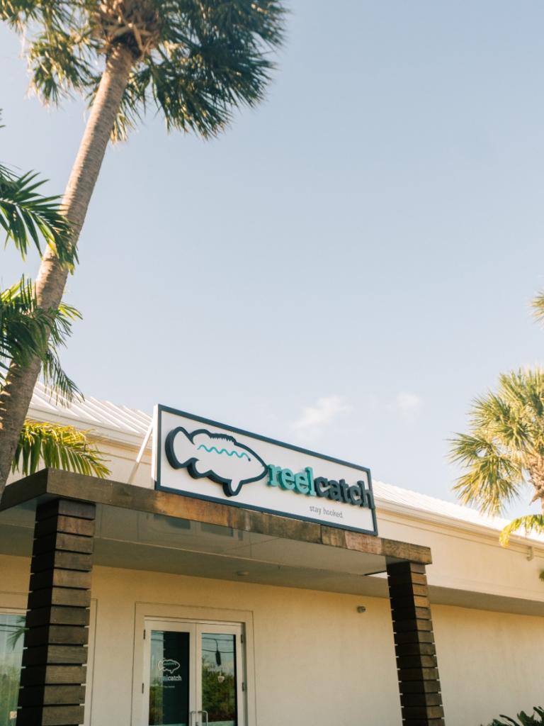 The entrance of ReelCatch, a seafood restaurant at Amara Cay in Islamorada, Florida.