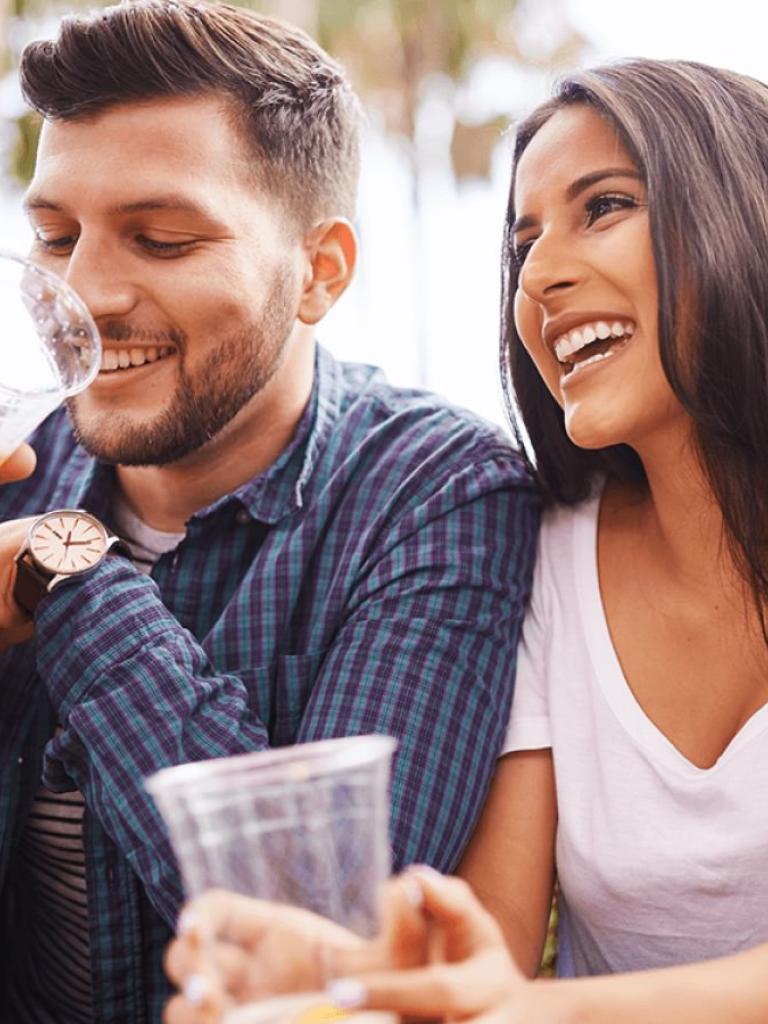 Couple enjoying beers
