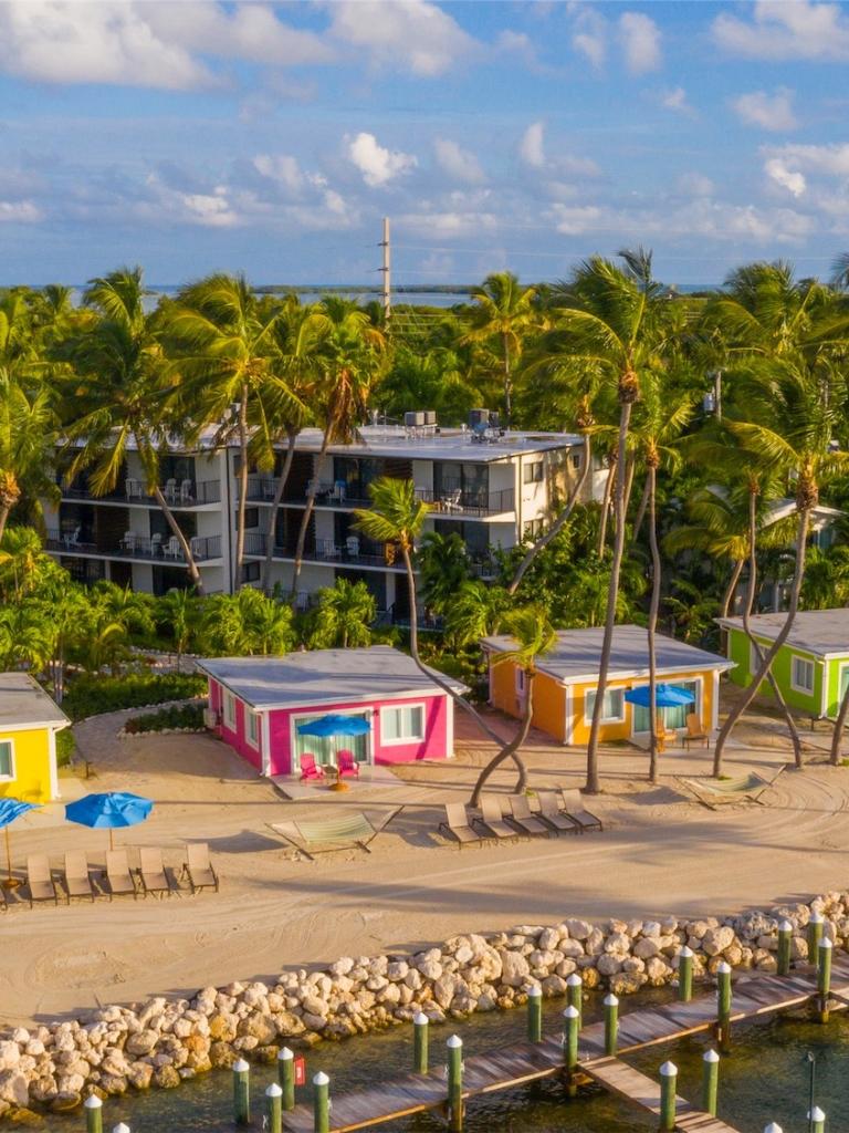 aerial shot of ocean front cottages and beach