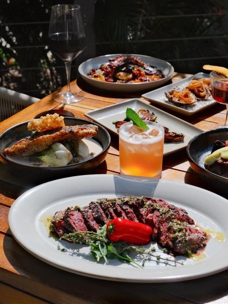 A food scape on a table outside at Kindler, a restaurant in Islamorada.