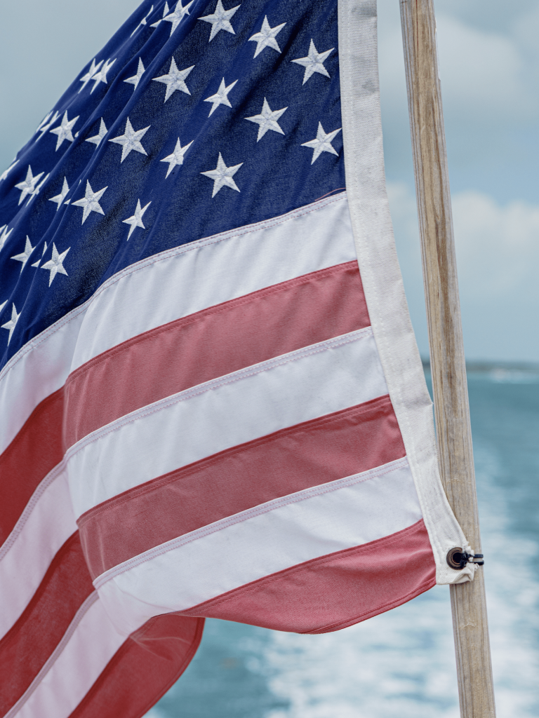 American Flag Behind Boat