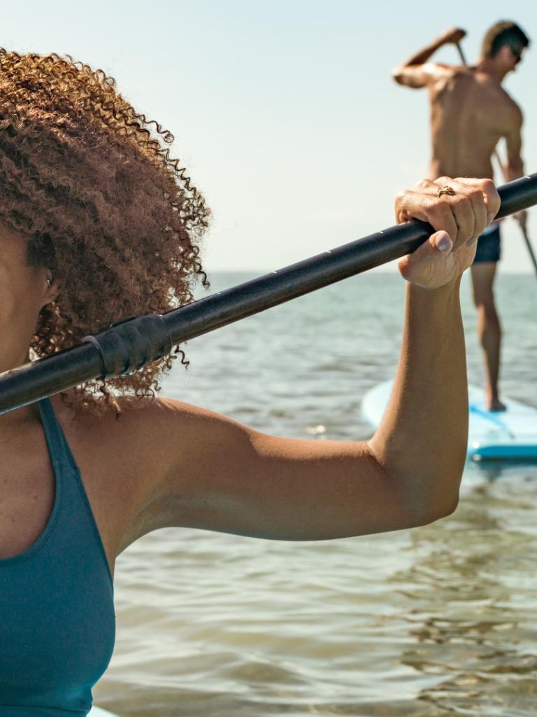 Woman paddleboarding