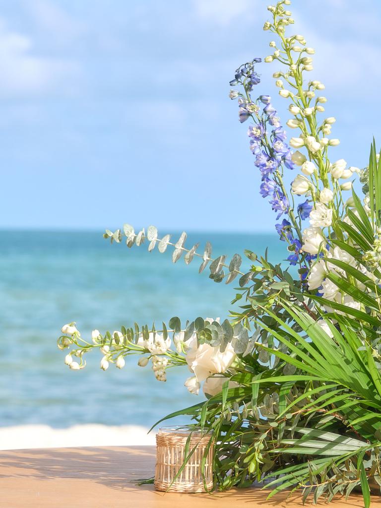 Flowers from Helm to Hearth with the ocean in the background.