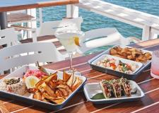 A table full of fresh dishes from Little Limon.