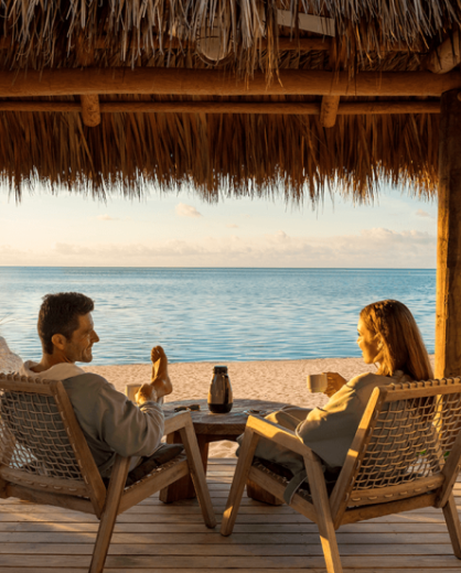 couple at the beach on chairs